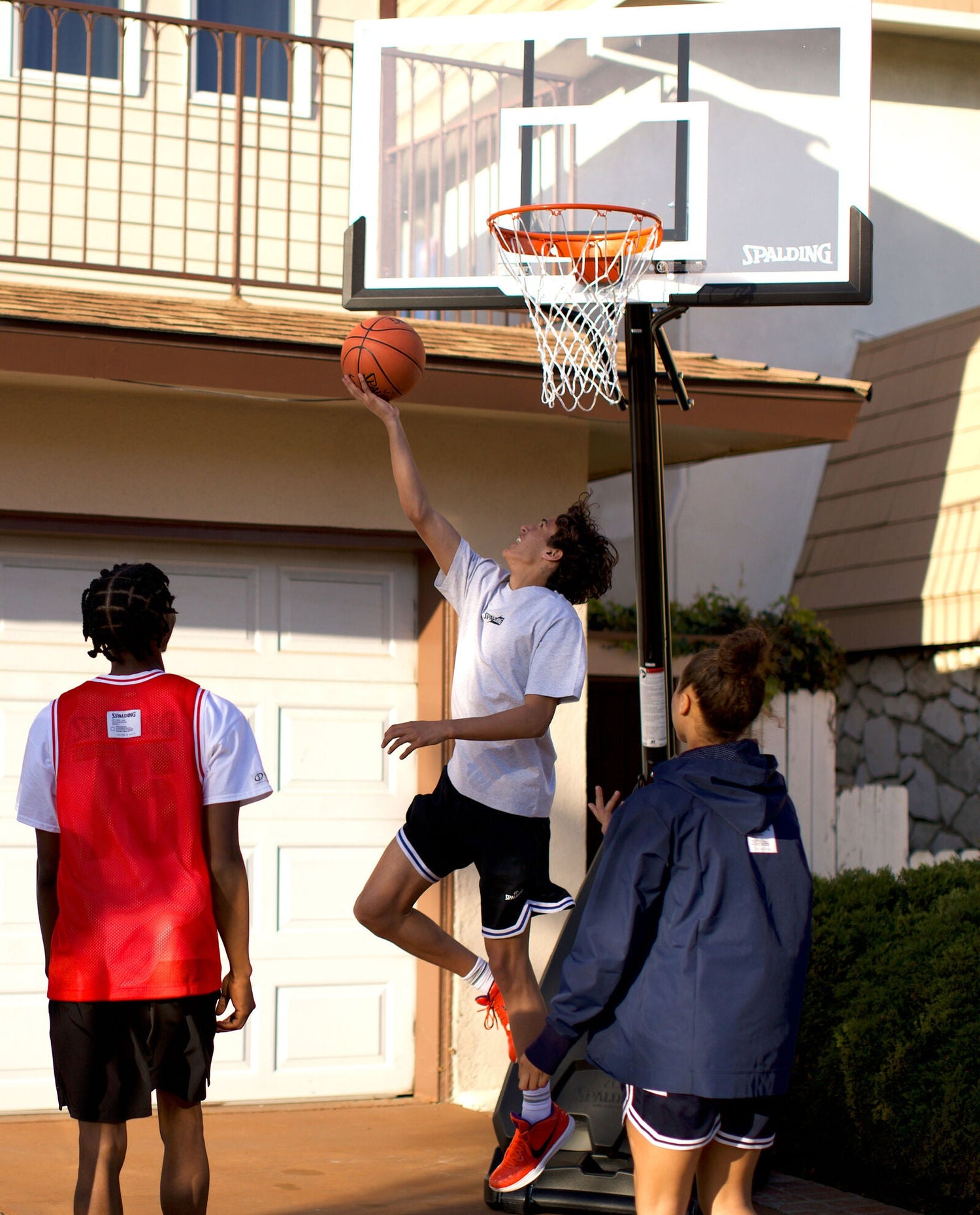 THE ULTIMATE HYBRID® Glass Portable Basketball Hoop